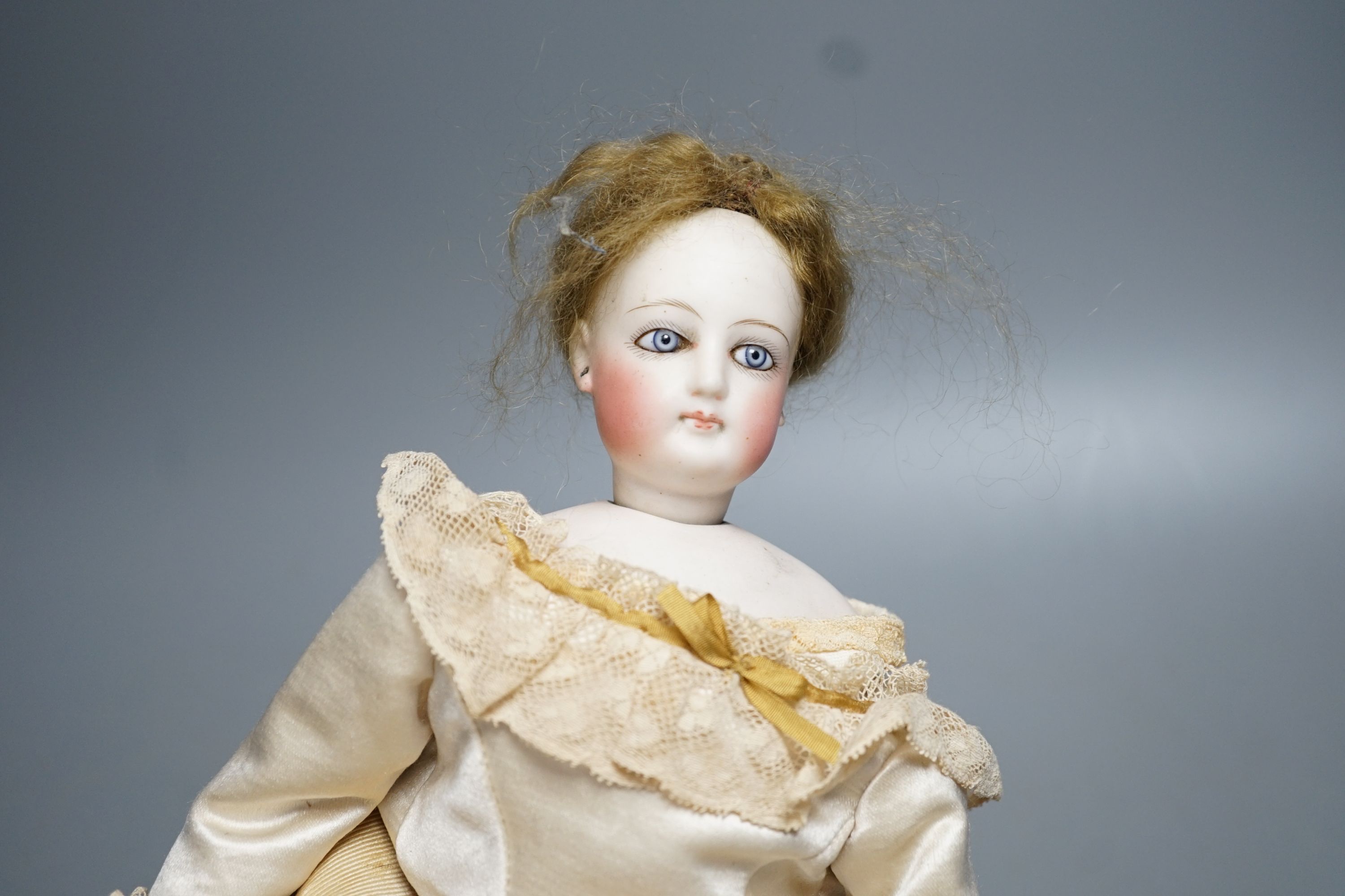 An S.G. bisque shoulder head French fashion doll c.1875, 36cm.